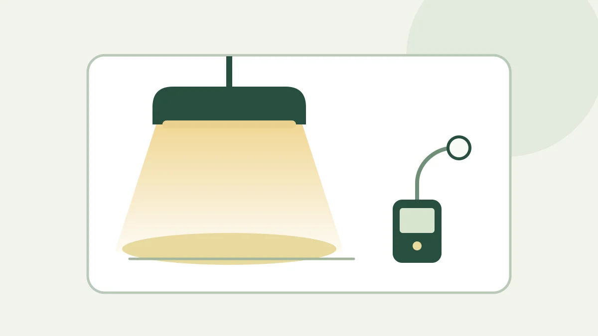 Stilisierte Lampe mit Lichtkegel und Messgerät ohne Messwertanzeige.